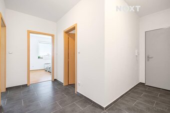Prostorné družstevní 2+kk se dvěma parkovacími místy a výhle