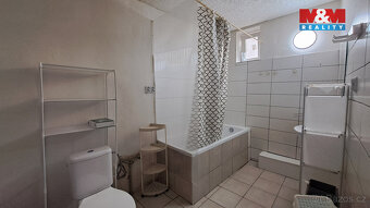 Nabízíme k prodeji prostorný rodinný dům v klidné části obce