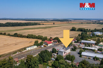 Nabízíme k prodeji dvoupodlažní nájemní dům v okrajové části