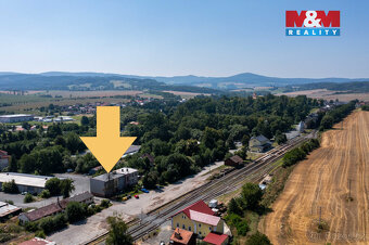 Nabízíme k prodeji dvoupodlažní nájemní dům v okrajové části