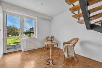 Ev.č. 01402 Nabízíme řadový rodinný dům v žádané a klidné čá