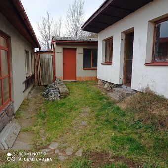 Na pozemku 700 m2 ,s garáží, zateplení, elektrokotel,kotel n