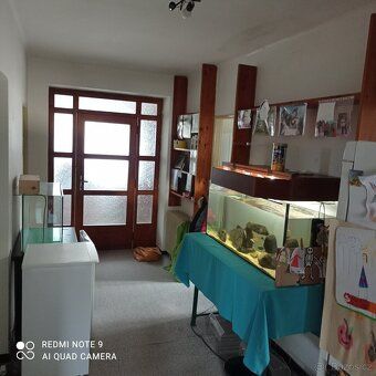 Na pozemku 700 m2 ,s garáží, zateplení, elektrokotel,kotel n