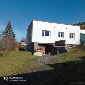 Na pozemku 700 m2 ,s garáží, zateplení, elektrokotel,kotel n