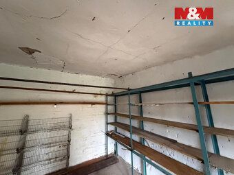 Nabízím k prodeji cihlovou řadovou garáž na vlastním pozemku
