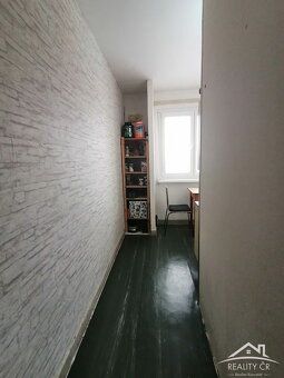 Pronájem bytu 1+1 v 6NP s výtahem a balkonem na ulici Bratří