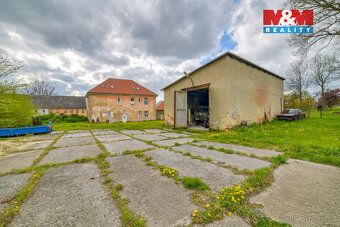 Nabízíme k prodeji nájemní dům v centru obce Nový Kostel umí