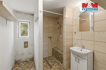 Samostatně stojící rodinný dům smíšené konstrukce nabízí pro