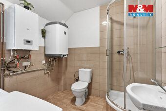 Nabízíme Vám k prodeji rodinný dům se dvěma samostatnými byt