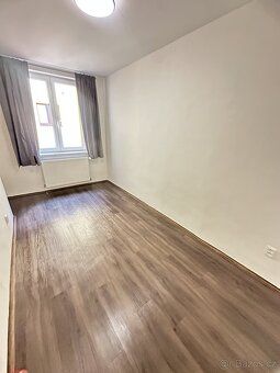 Ev.č. 00103 Hledáte moderní, praktické a zároveň útulné bydl