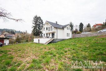 Moderní rodinný dům 5+1 se zahradou - Mnichovice.
Nabízíme n
