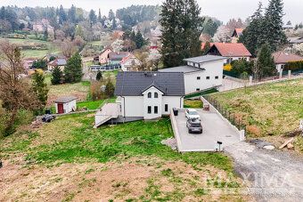 Moderní rodinný dům 5+1 se zahradou - Mnichovice.
Nabízíme n