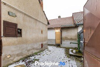 Ev.č. 100167-1 Dům se stodolou, hospodářskými stavbami a vel