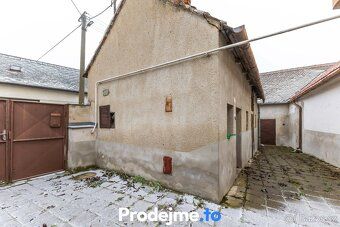 Ev.č. 100167-1 Dům se stodolou, hospodářskými stavbami a vel