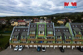 Nabízíme k prodeji prostorný mezonetový byt 2+kk o užitné pl