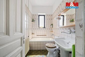 Nabízíme k prodeji prostorný rodinný dům v klidné části obce