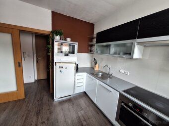 Nabízíme k prodeji světly stylový , mezonetový byt o podlaho