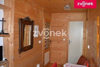 Původní dřevěnice, která byla před cca 30 lety zrenovována a