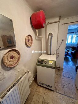 Ev.č. 100955 Zprostředkujeme vám prodej staršího rodinného d