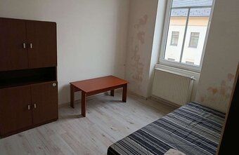 Nabízíme k dlouhodobému pronájmu byt v 1.patře řadového domu