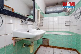 Nabízíme k prodeji samostatně stojící rodinný dům v centru m