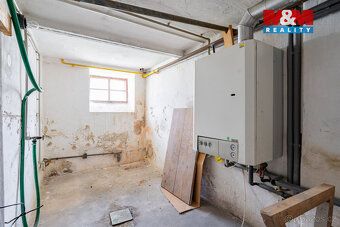 ​Nabízíme k prodeji řadový rodinný dům v žádané lokalitě měs