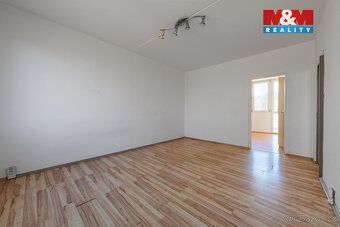 Příjemný, slunný byt ve 4. patře zatepleného a udržovaného d