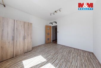 Příjemný, slunný byt ve 4. patře zatepleného a udržovaného d