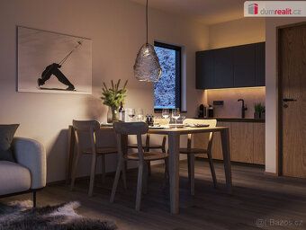 BENEFIT - New kitchen unit including appliances, garage parking space and ski storage room…