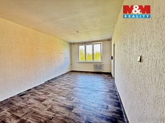 Prodej bytu o dispozici 2+1 a celkové výměře 66 m² v klidné 