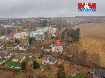 Stavba občanské vybavení se započatou rekonstrukcí, s projek