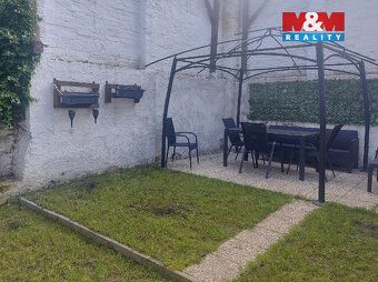 Prodej exkluzivního bytu o dispozici 4+1 v podkroví rodinnéh