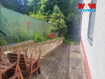 Prodej exkluzivního bytu o dispozici 4+1 v podkroví rodinnéh