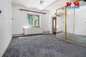 Nabízíme k prodeji samostatně stojící rodinný dům v centru m