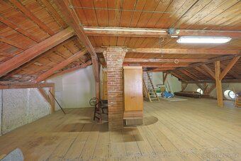 For sale is a smaller half of a house with 2 residential units, garden and parking – Kořenov…