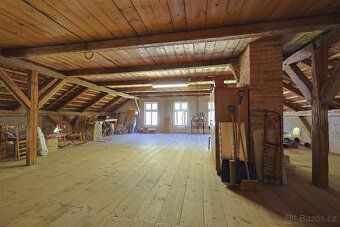 For sale is a smaller half of a house with 2 residential units, garden and parking – Kořenov…