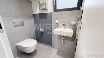 We offer for sale a modern maisonette apartment with layout 4+kk and