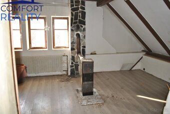 We offer for sale a family house with 4+1 bedrooms in the village of Jiříkov