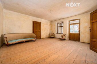 We offer for sale an exceptional historic house in the village of Panenský Týnec