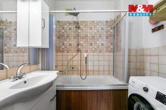 Nabízíme prodej rodinného domu o zastavěné ploše 255 m2 a di