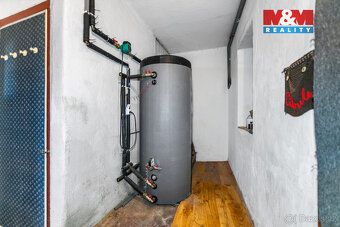 Nabízíme prodej rodinného domu o zastavěné ploše 255 m2 a di