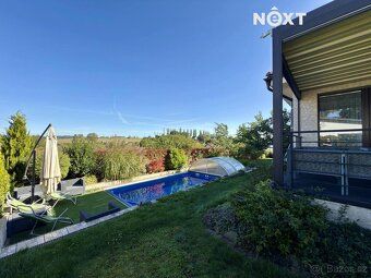 Under exclusive representation we offer an exceptional, modern, recently built family house 6+kitchenette.