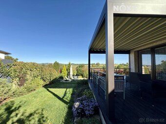 Under exclusive representation we offer an exceptional, modern, recently built family house 6+kitchenette.