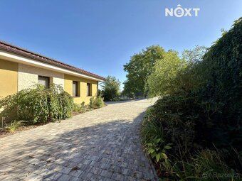 Under exclusive representation we offer an exceptional, modern, recently built family house 6+kitchenette.