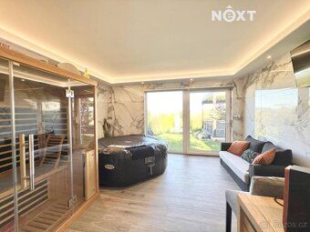 Under exclusive representation we offer an exceptional, modern, recently built family house 6+kitchenette.