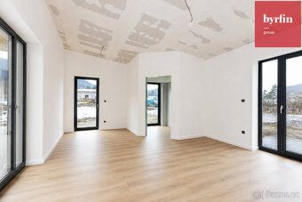 We offer for sale an under construction family house with a layout of 4+kk