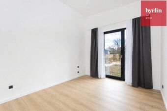 We offer for sale an under construction family house with a layout of 4+kk