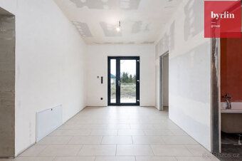 We offer for sale an under construction family house with a layout of 4+kk