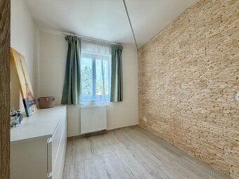 Nabízíme k pronájmu kompletně zrekonstruovaný byt 1+1 v domě