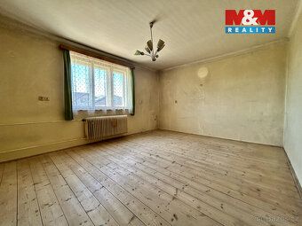 V klidné části města Protivín nabízíme k prodeji dvoupodlažn